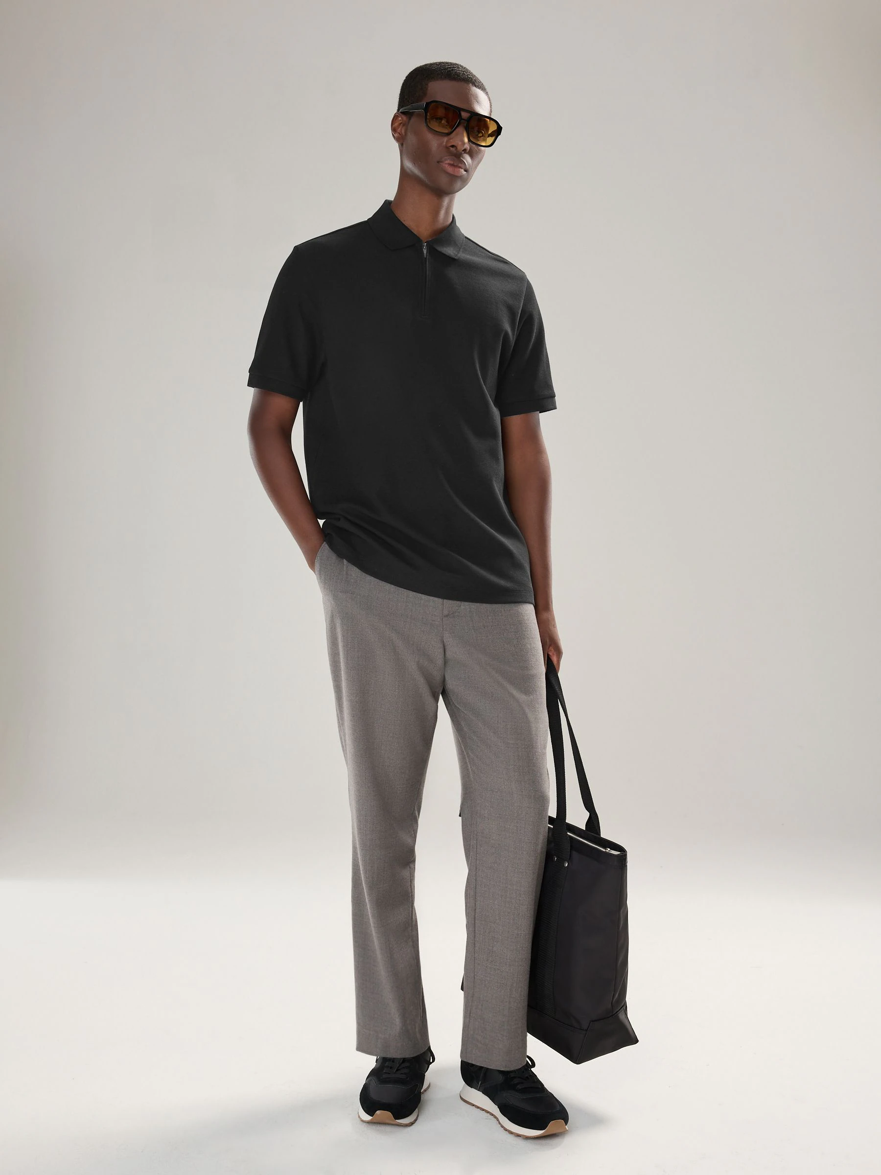 Zwart - Smart poloshirt met textuur en rits