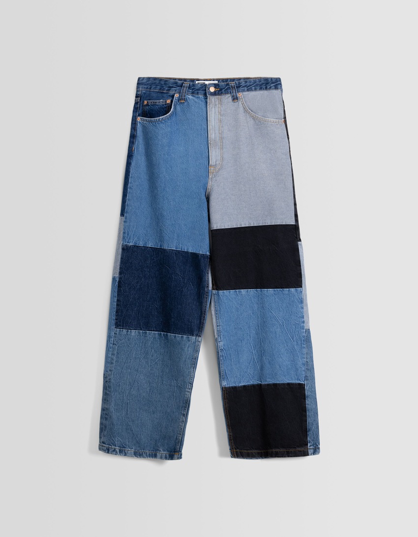 calças jeans super largas com blocos de cores