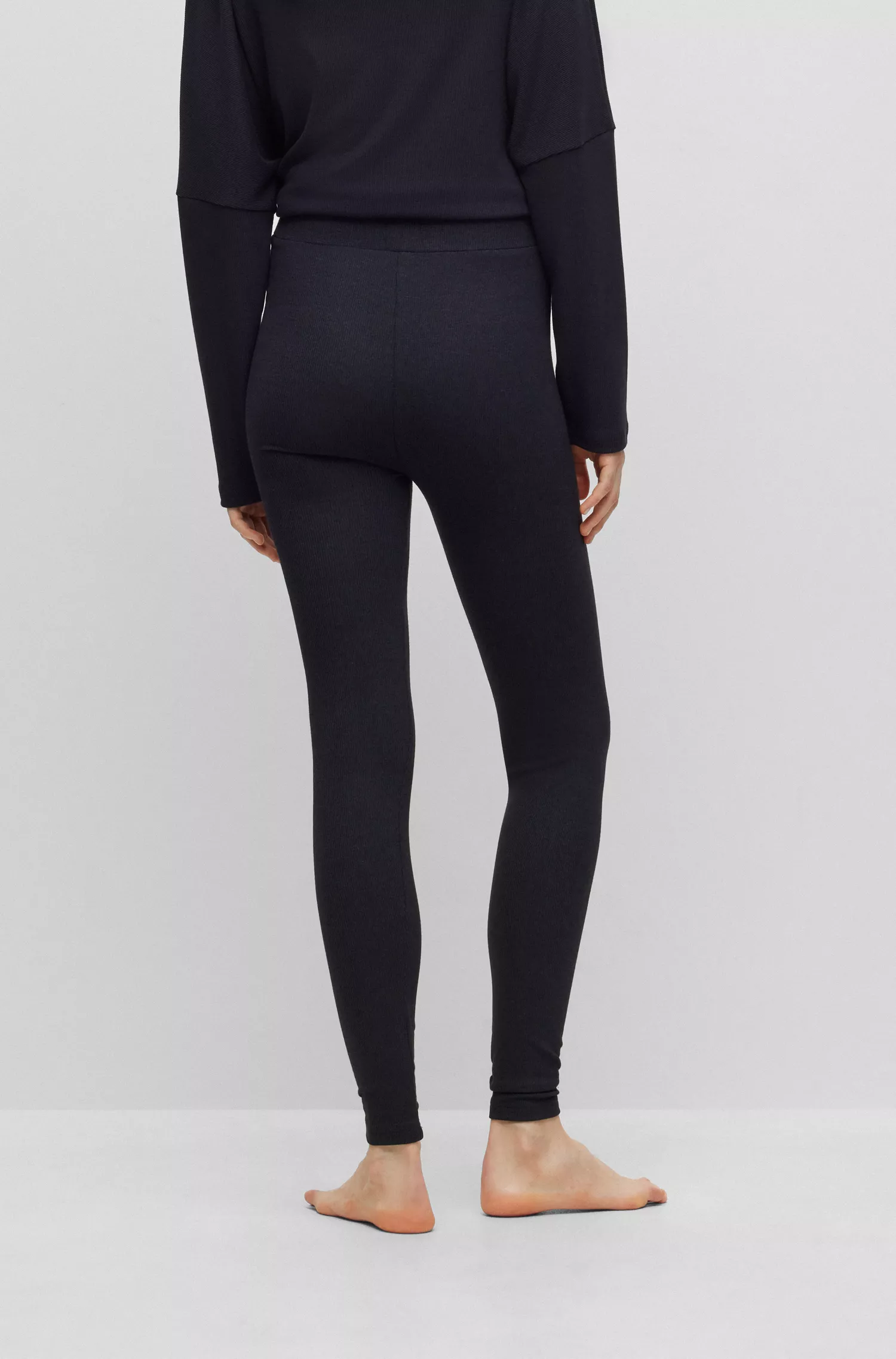Calça legging de pijama HUGO vermelha, modelagem skinny, com cós com logo.