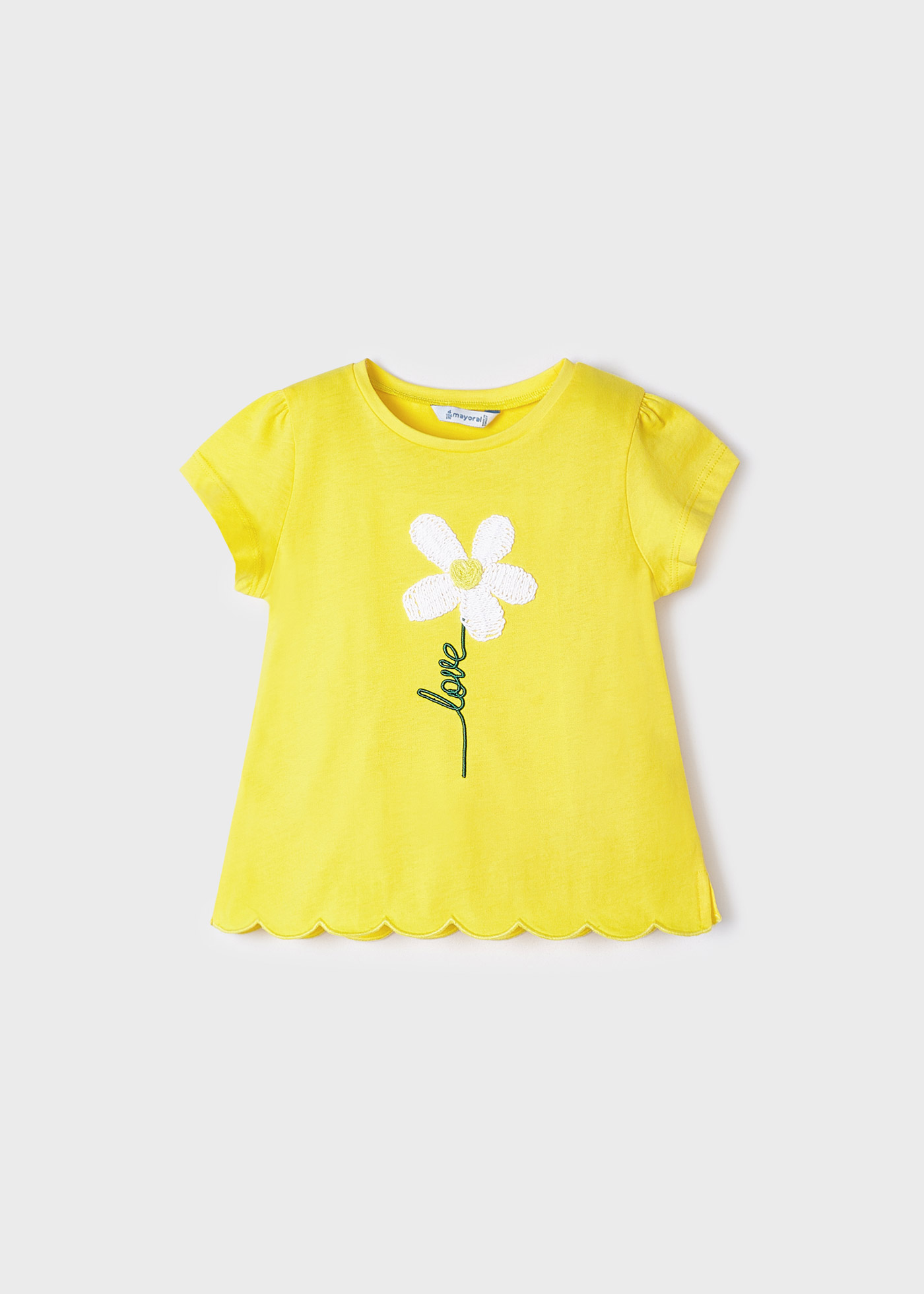 Camiseta feminina de algodão de manga curta com estampa bordada.