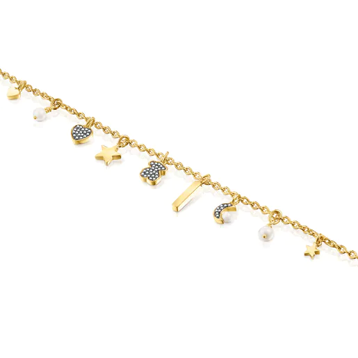 Pulseira com banho de ouro 18k sobre prata, diamantes e pérolas com 5 motivos noturnos.