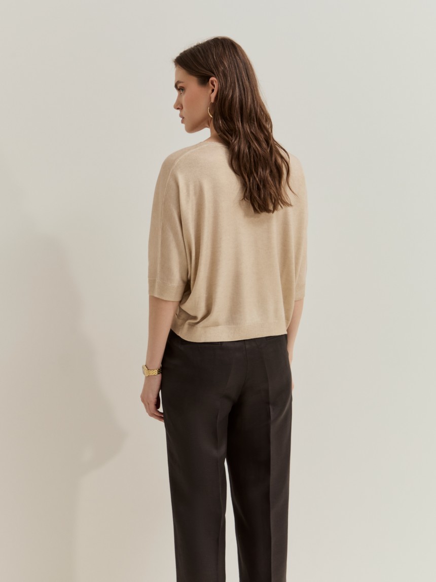 Camisola de malha dourada