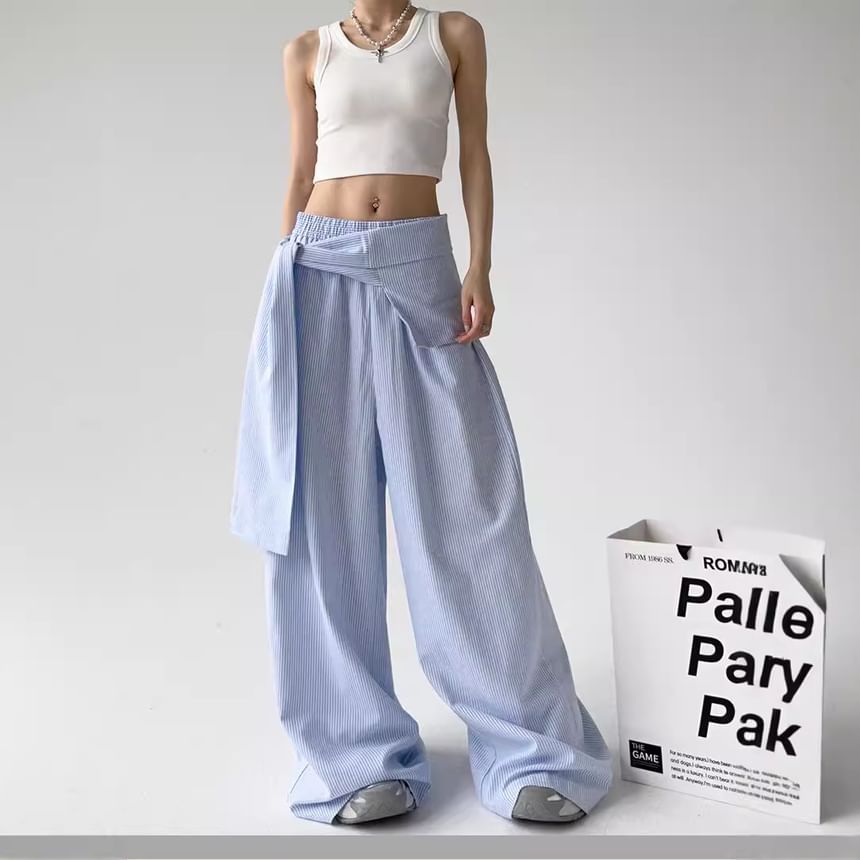 Rosesand - Gestreepte, losse, wijde broek met lage taille