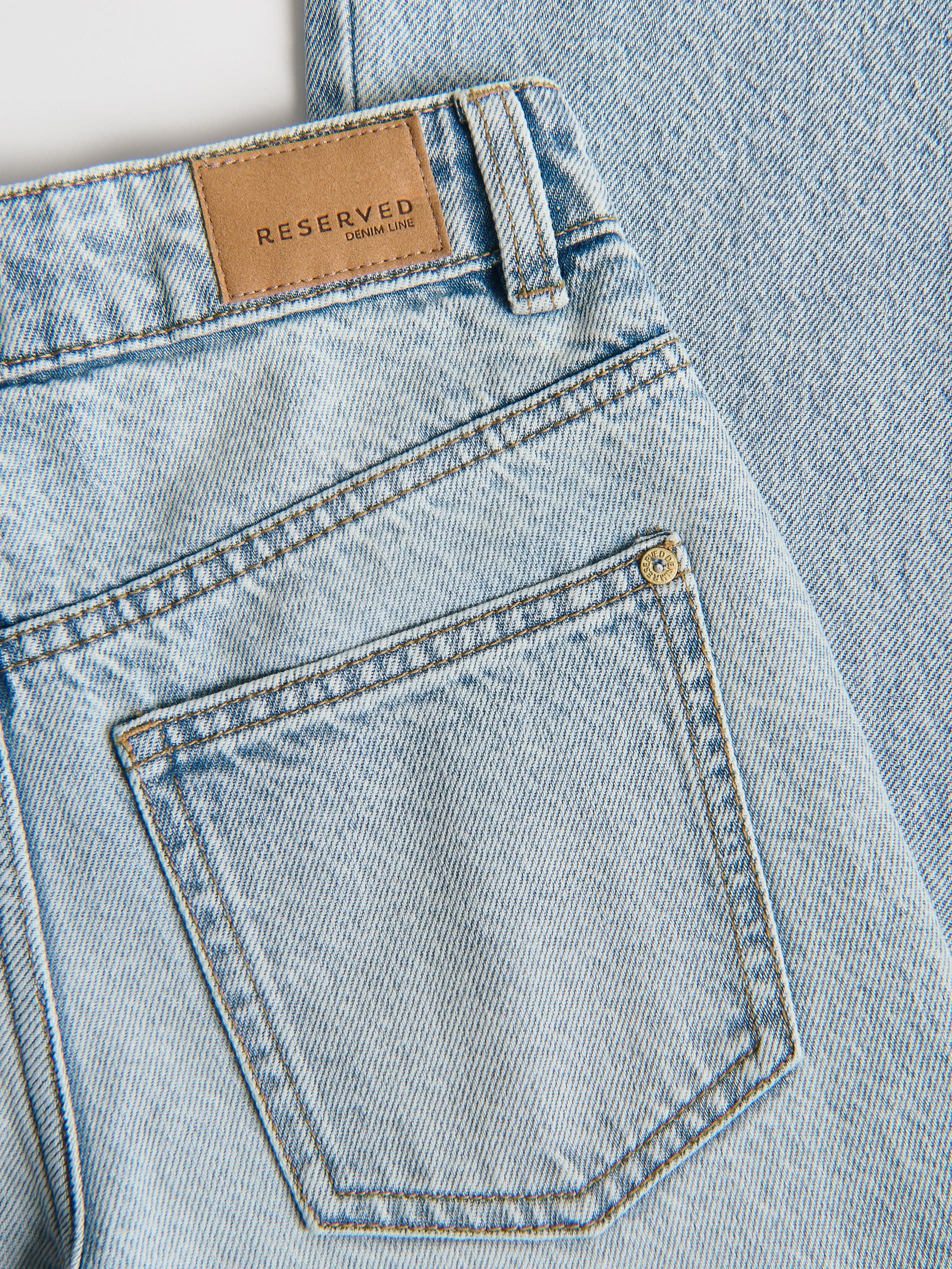 Distressed bootcut jeans