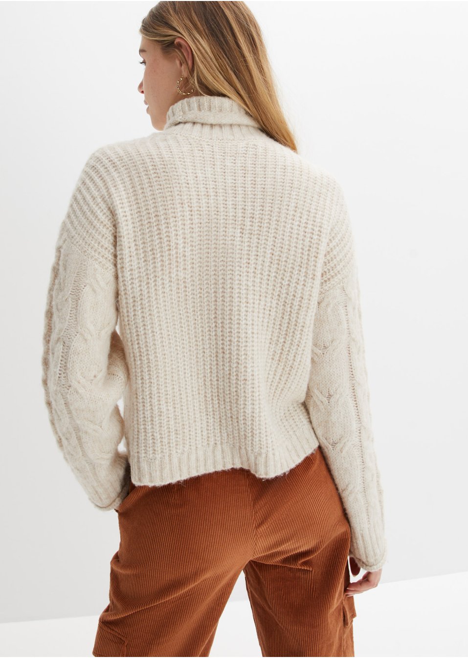 Pull en maille à torsades