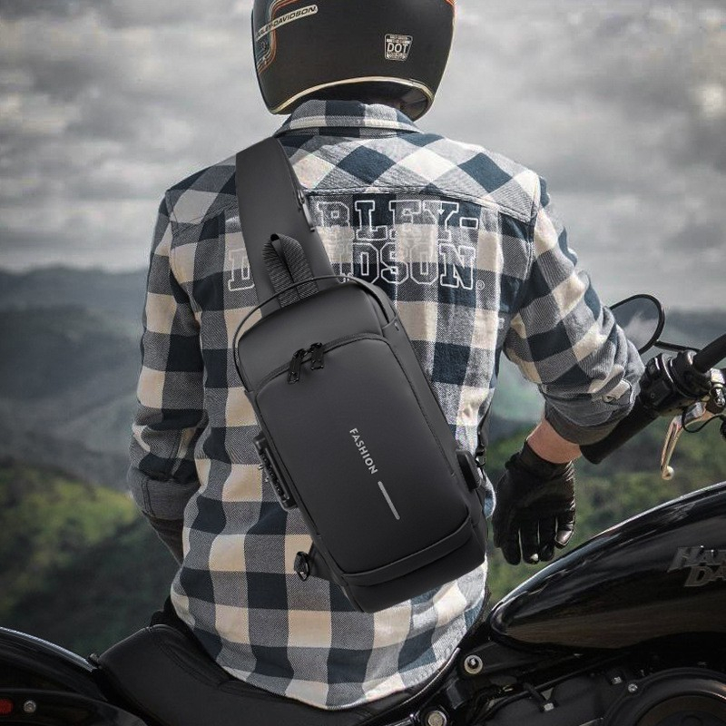 (34x15x9cm) Wasserabweisende Outdoor Schultertasche Anti-Theft Crossbody Bag mit Sicherheitsschloss und USB Port - Schwarz