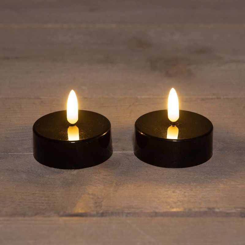 Anna's Collection Jumbo theelichtjes/waxinelichtjes 4x zwart D6 x H4,5 3D vlam timer kaarsen