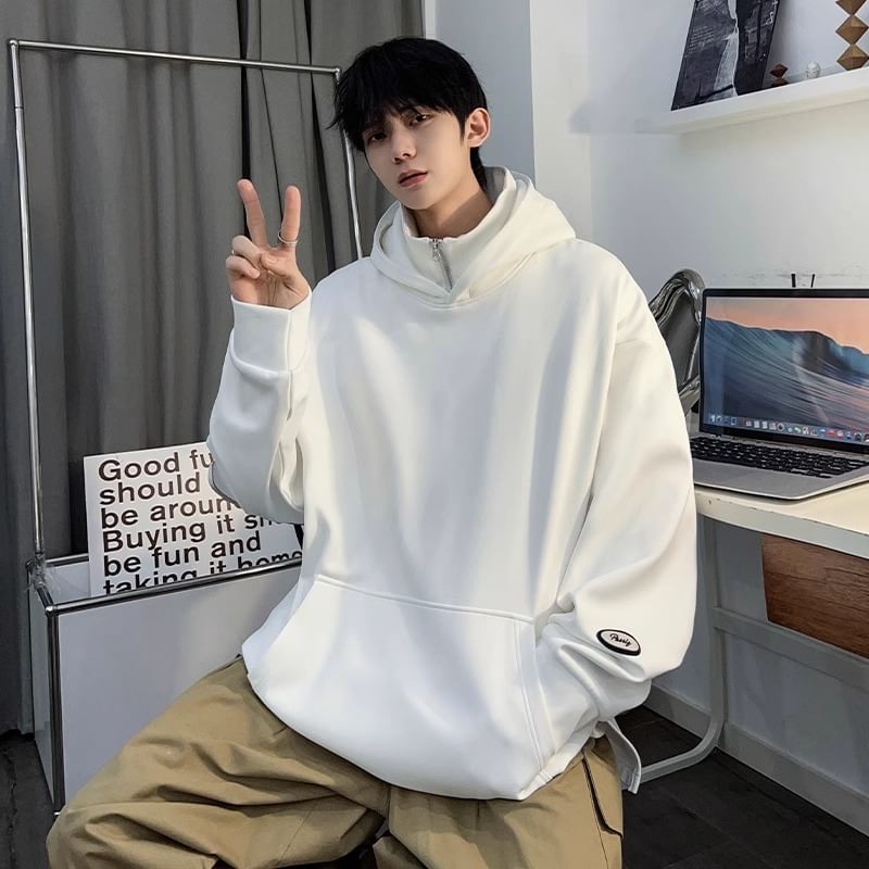 emeisa - Oversized hoodie met opstaande kraag en halve ritssluiting
