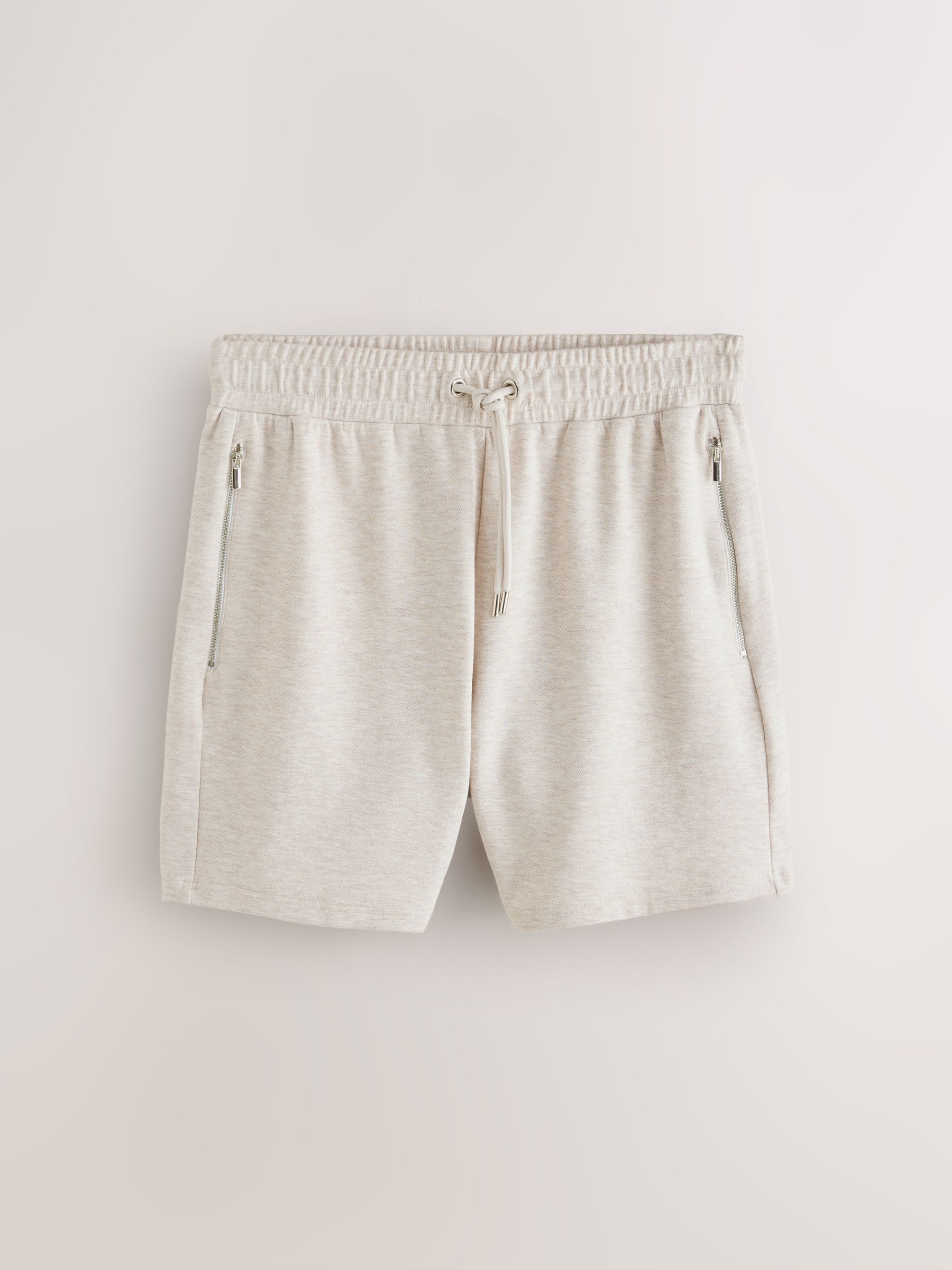 Gemêleerd naturel - Jersey shorts met ritszakje