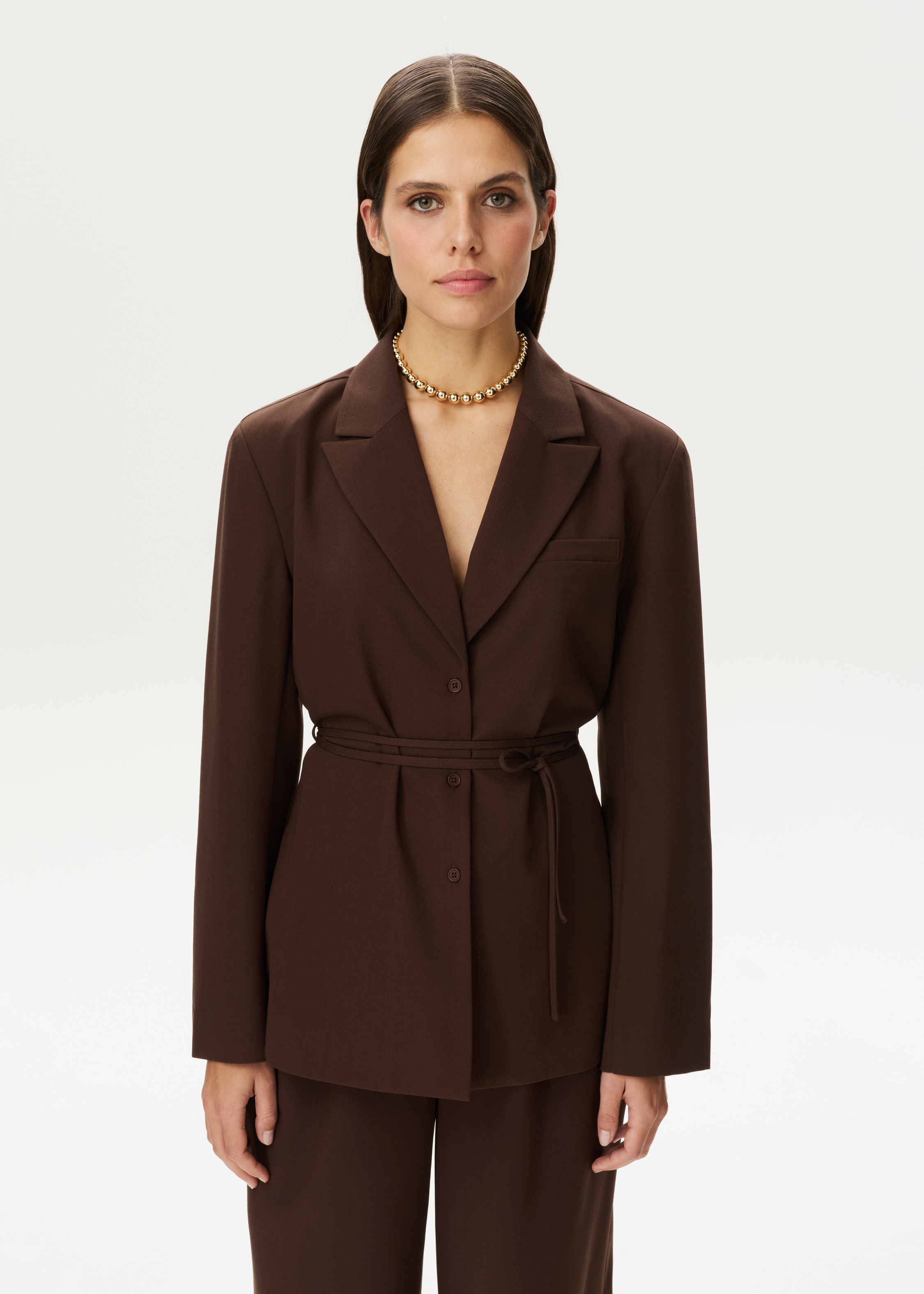 Blouse met blazer look