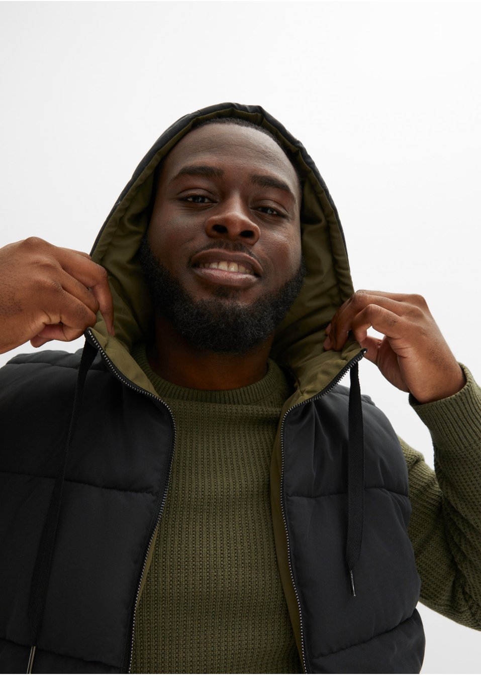 Veste sans manches matelassée réversible avec capuche en polyester recyclé