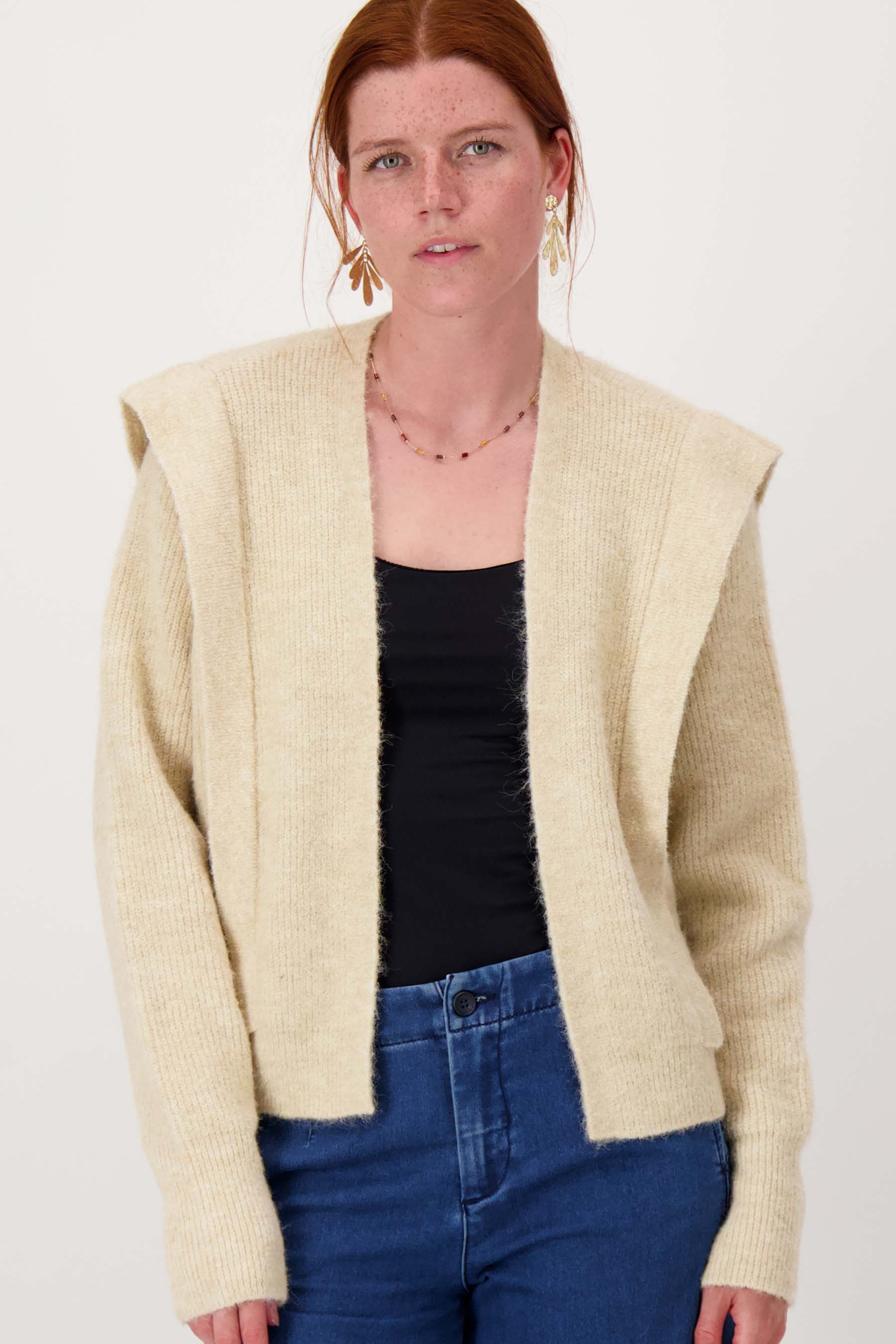 vest met schouder detail