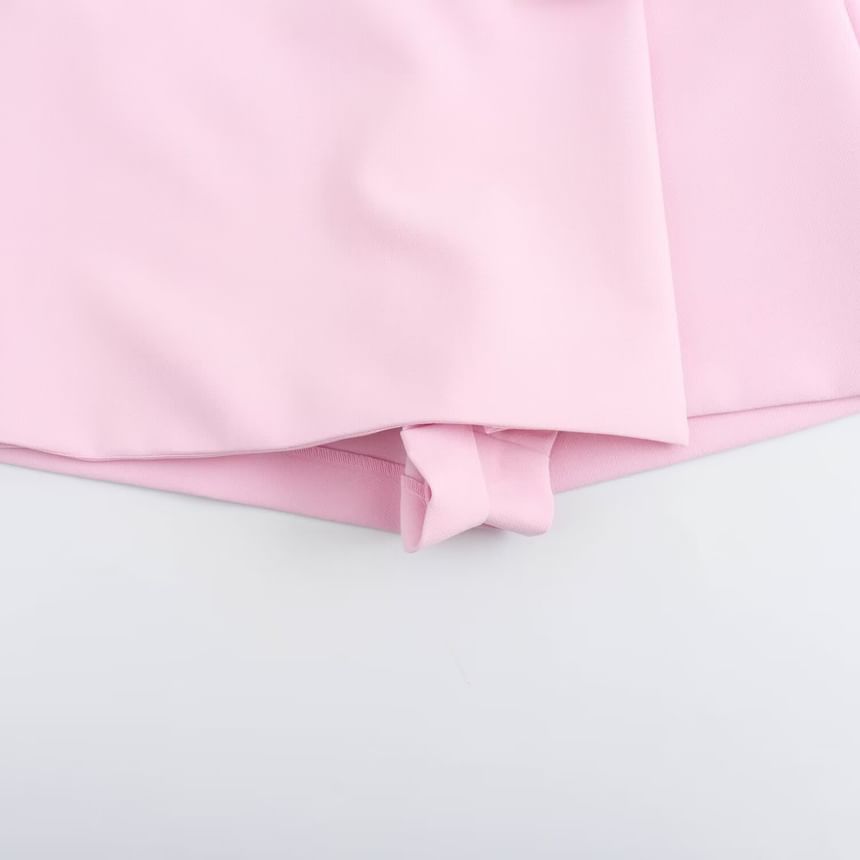 Sensarra - Mini-rok met halfhoge effen strik