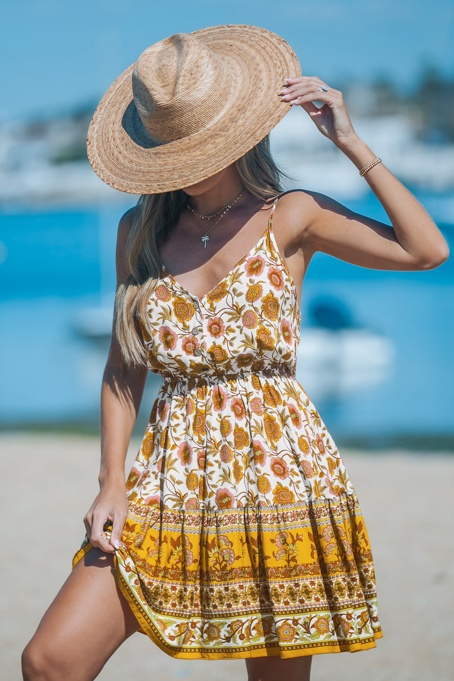 Robe mini sans manches avec col en V à fleurs