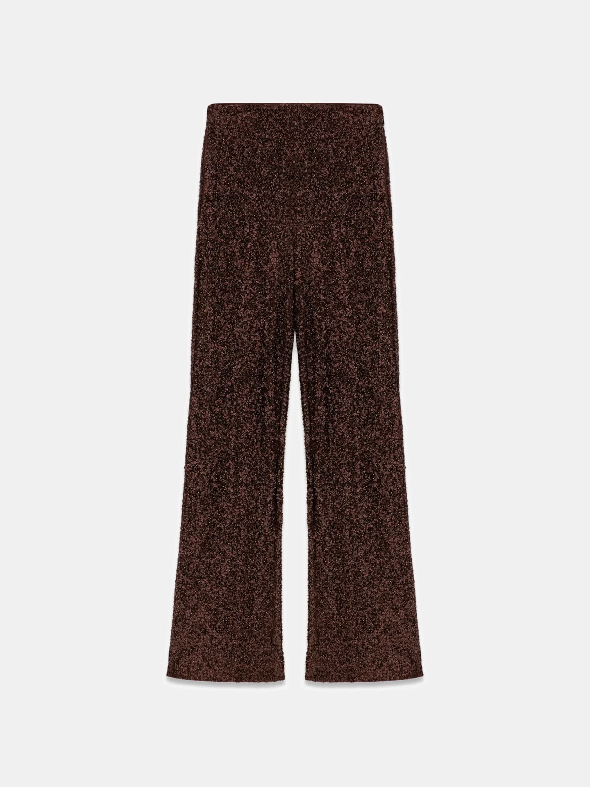 Calça boca de sino com lantejoulas