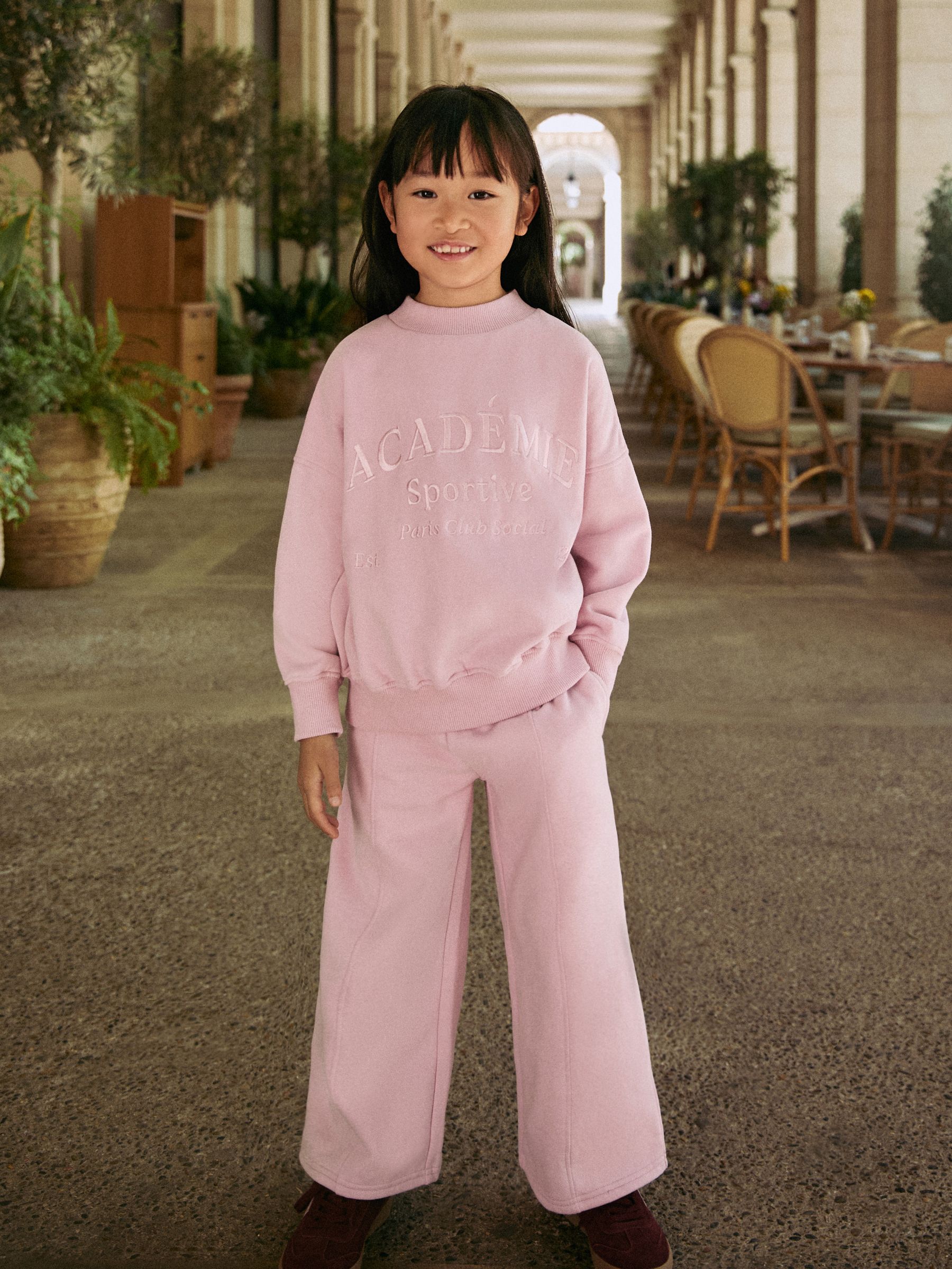 Roze met slogan - Set van sweatshirt en joggingbroek met wijde pijpen (3-16jr)