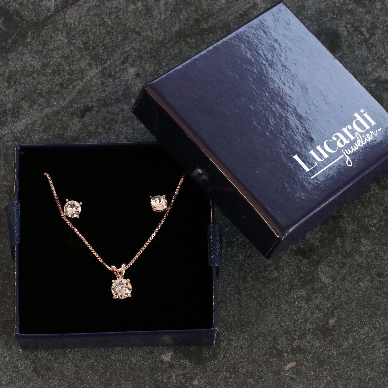 Zilveren set rose kristal wit