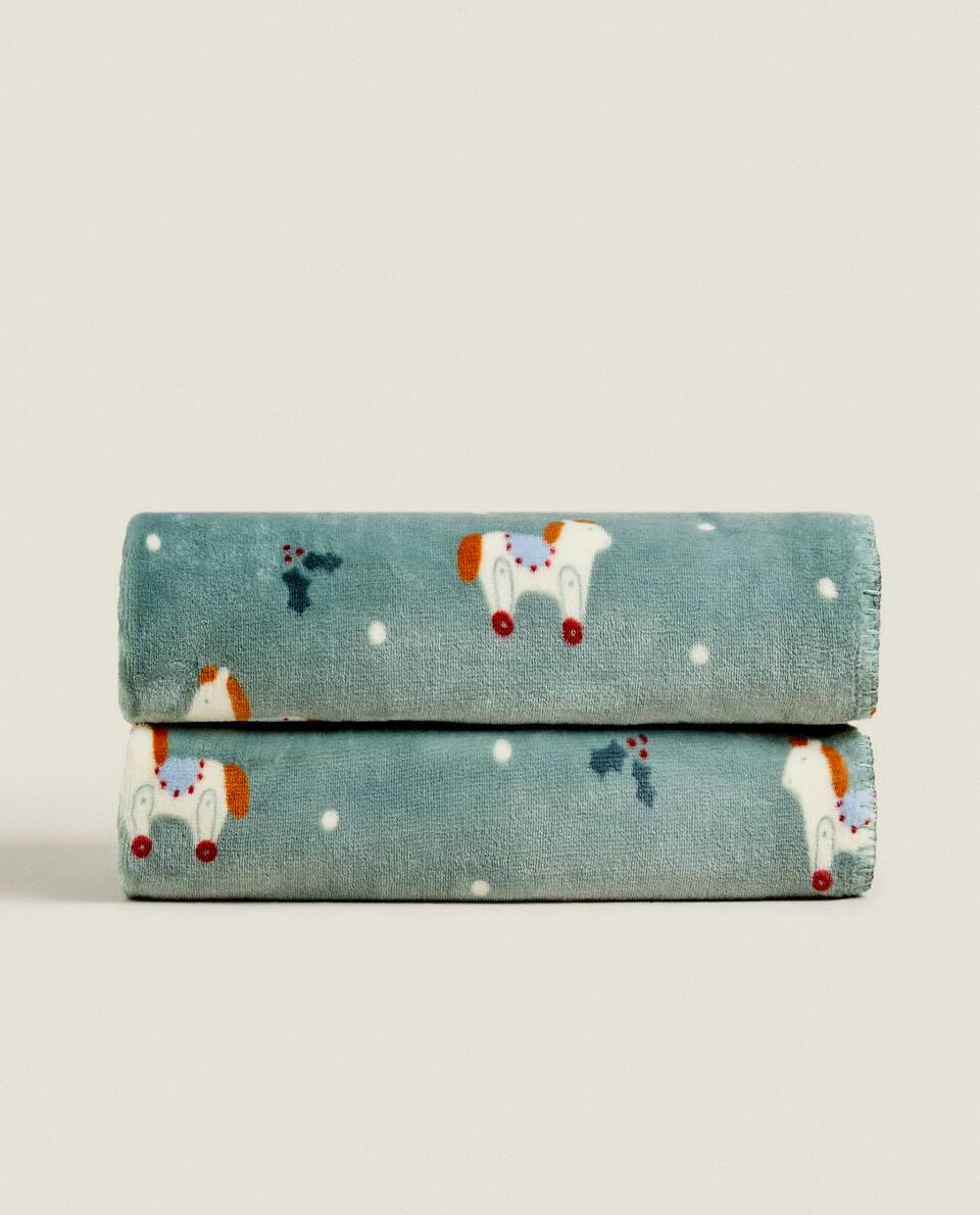 Manta infantil de lã com cavalo de balanço de Natal