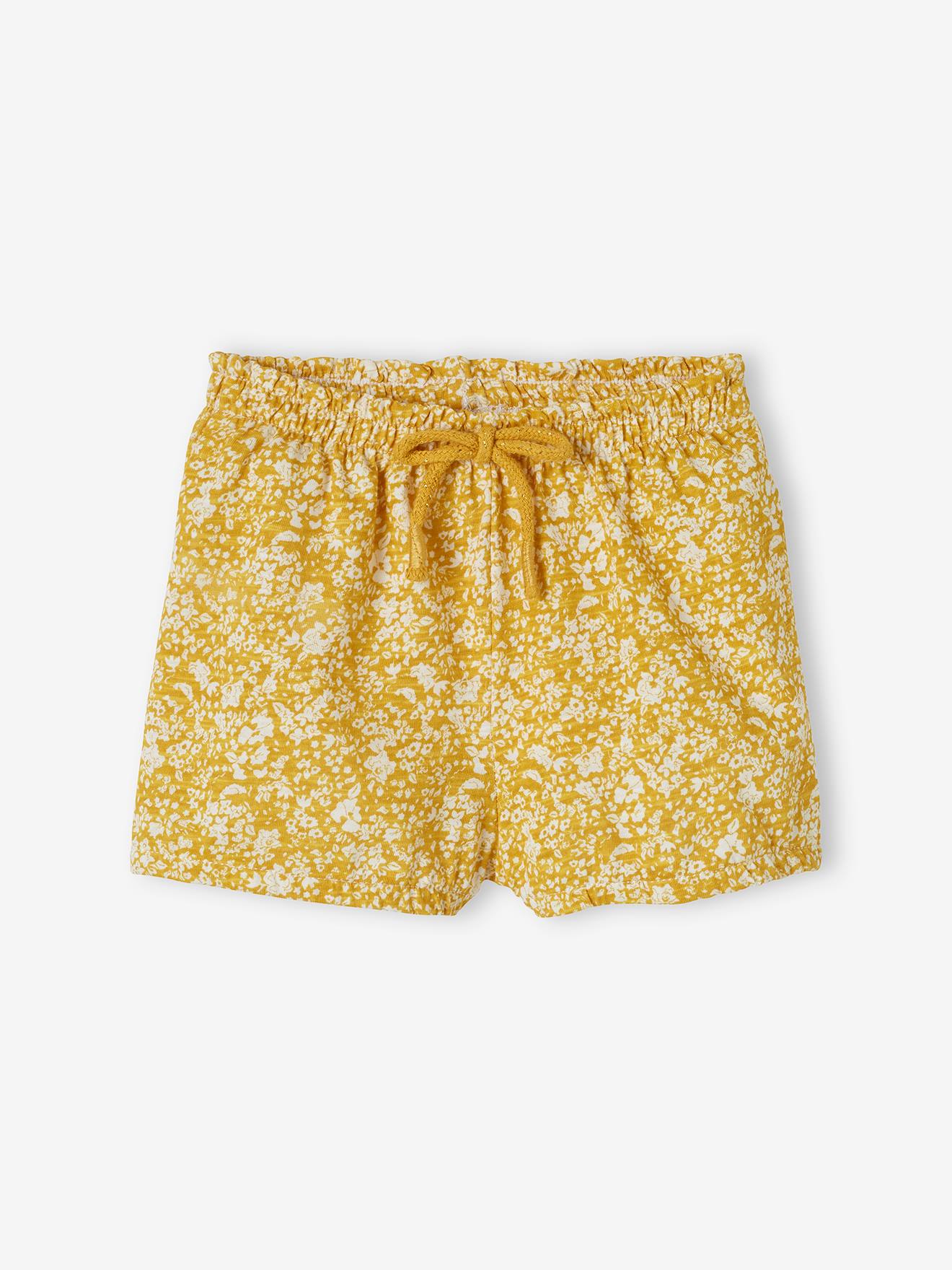 Calção infantil para menina em malha branca clara com estampa.
