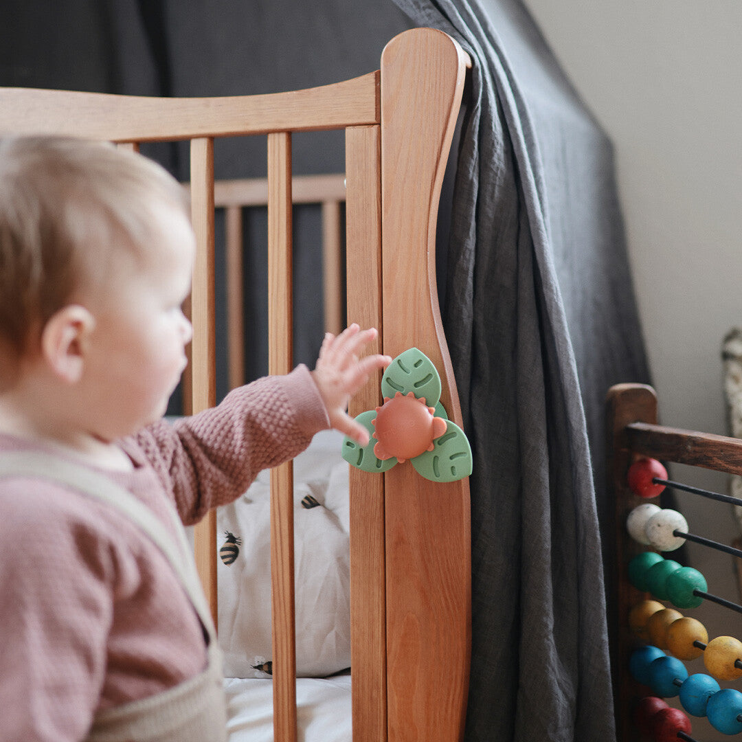 Mushie babyspeeltje spinner met zuignap - dino