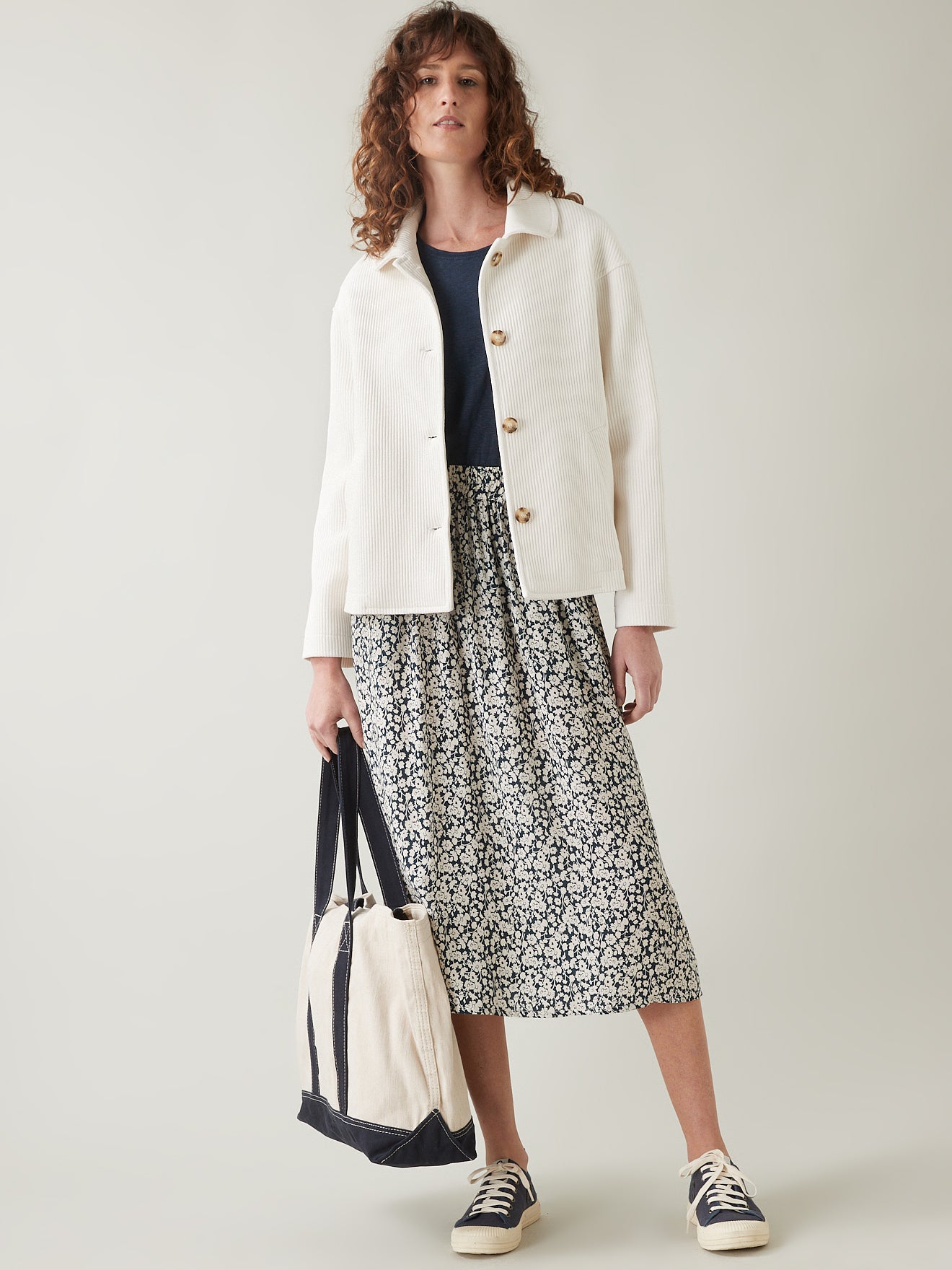 Manteau court tissu natté femme