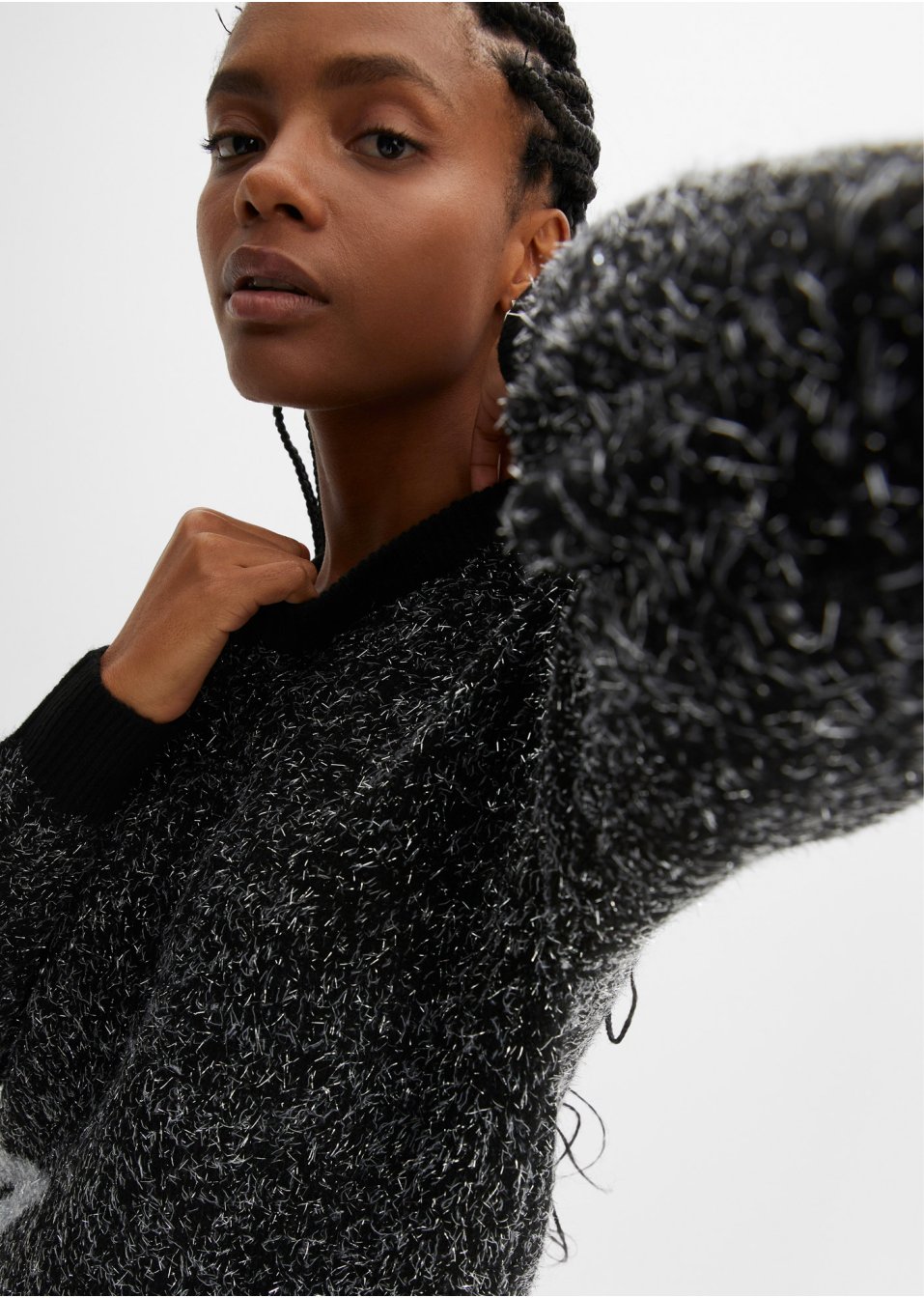 Pull à paillettes avec motifs étoiles