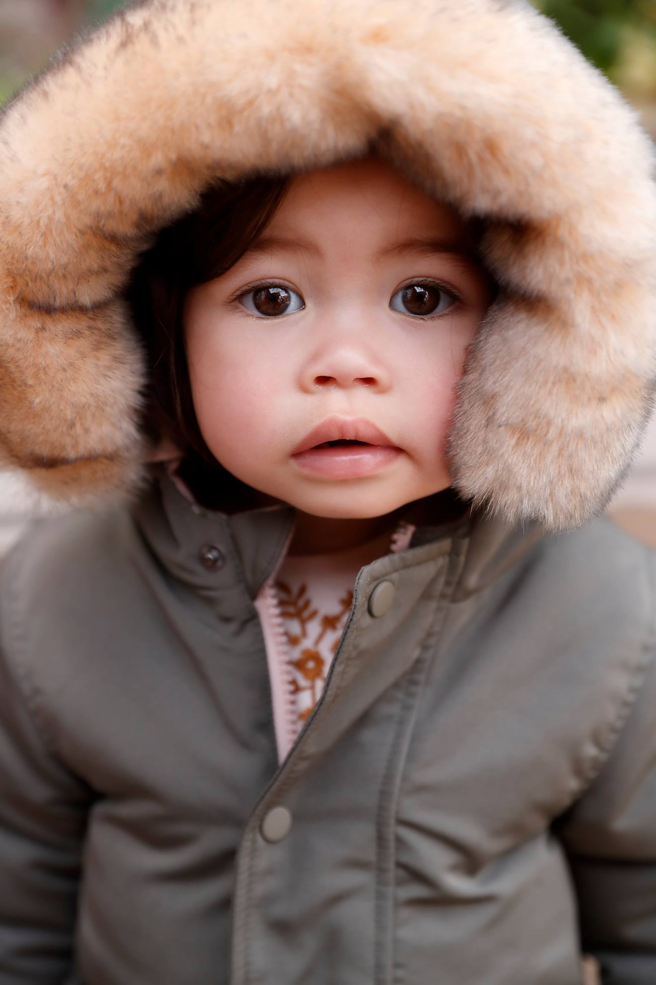 Parka reversível para bebê, com enchimento de poliéster reciclado, verde médio liso com estampas.