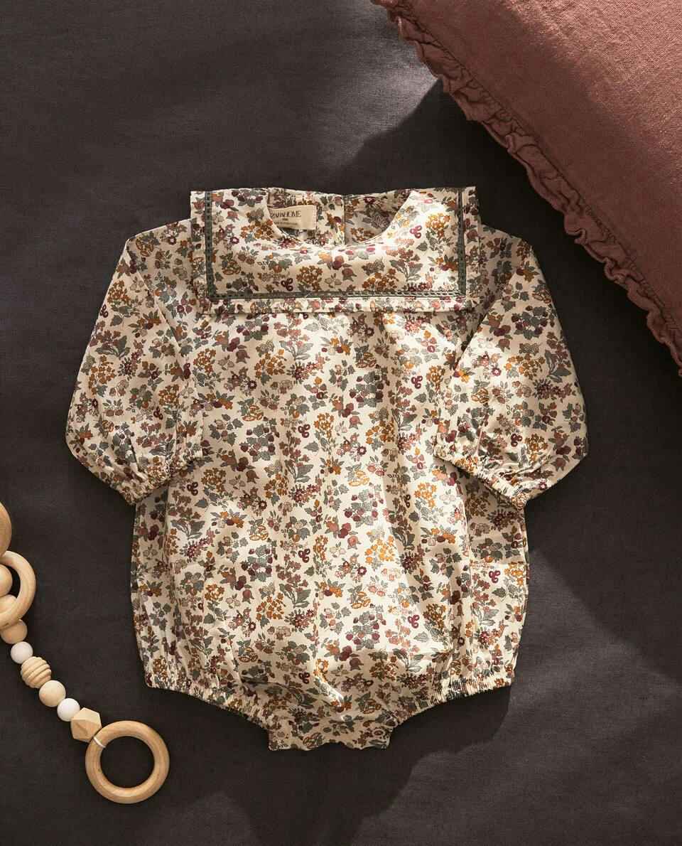 Body infantil em tecido com estampa floral