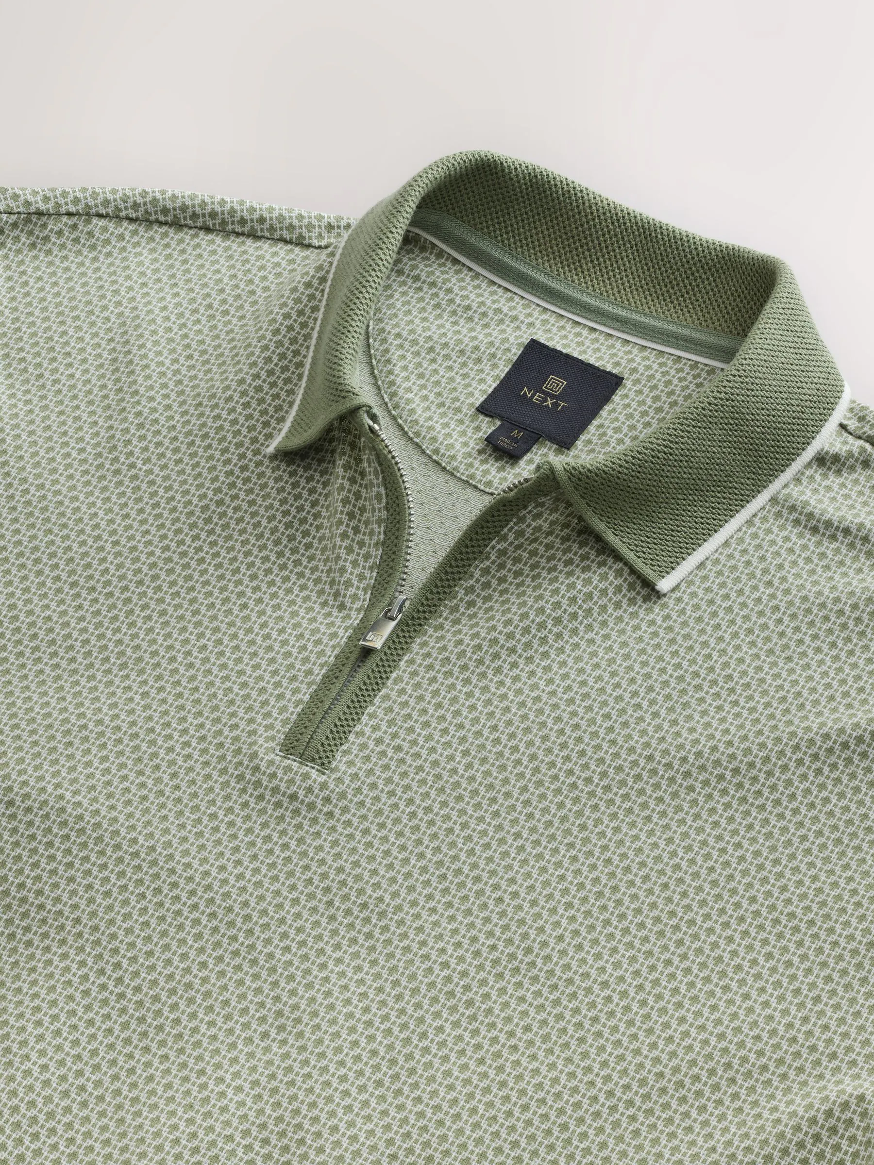Grijs-groen - Modieus poloshirt met kwartrits
