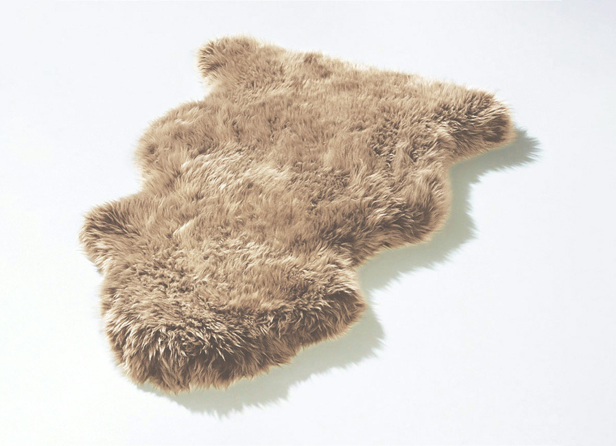 Vorleger aus echtem Lammfell in Tierform