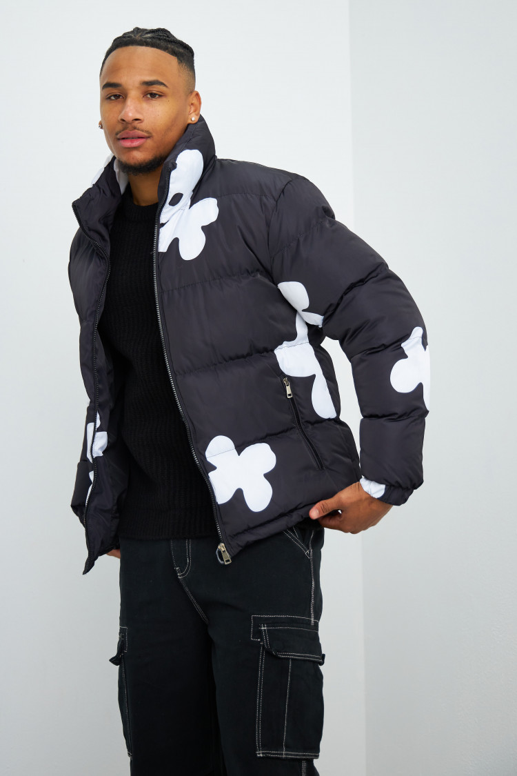 Doudoune noir et blanche matelassée à fleurs