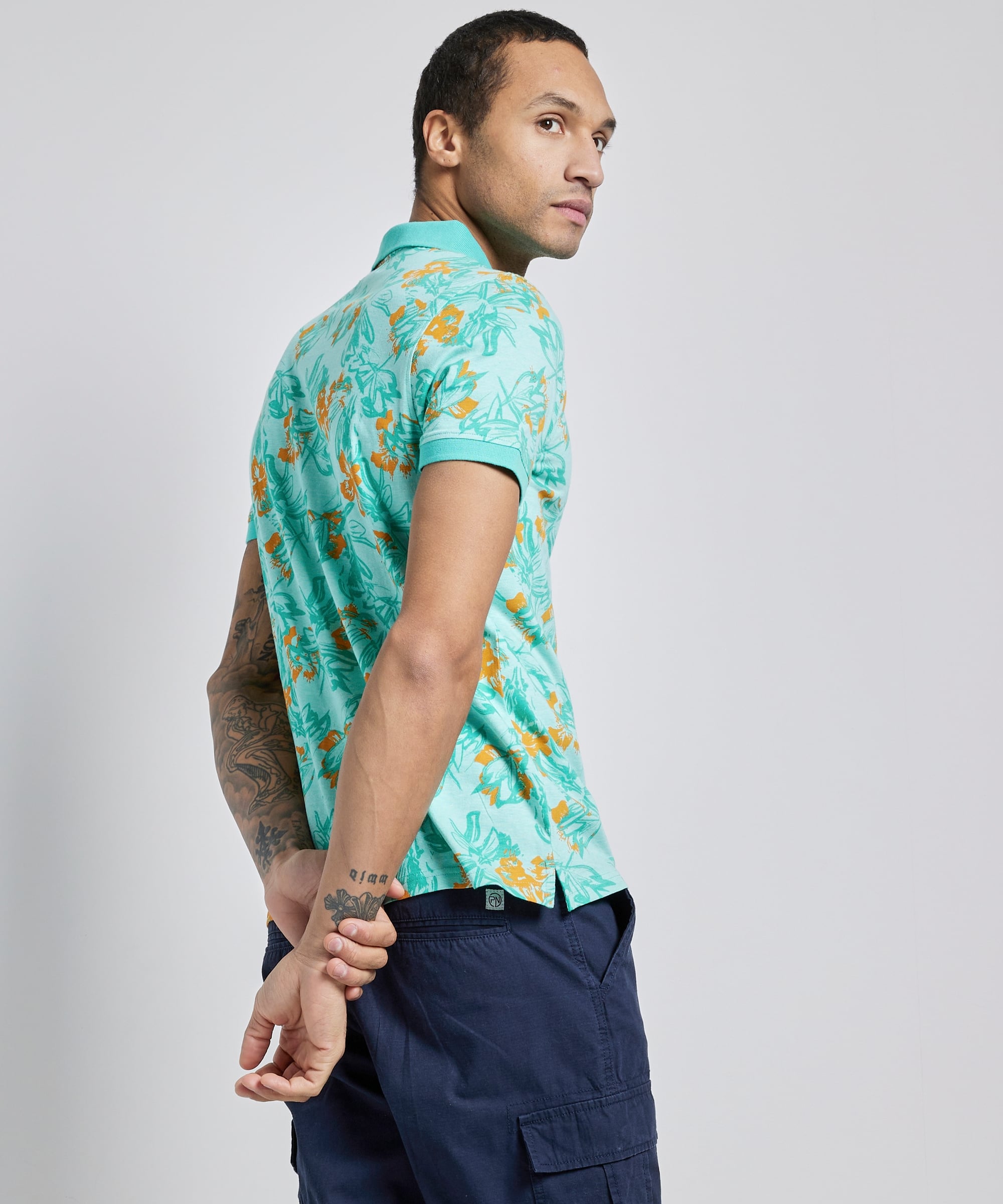 polo met tropische print