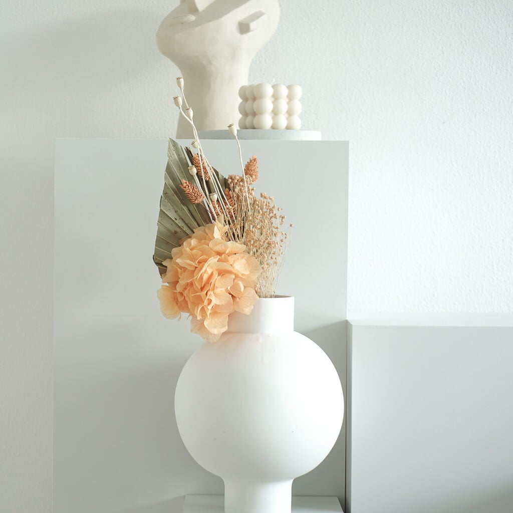 Natuurlijk mooi: een klein boeketje gedroogde bloemen voor subtiele charme.