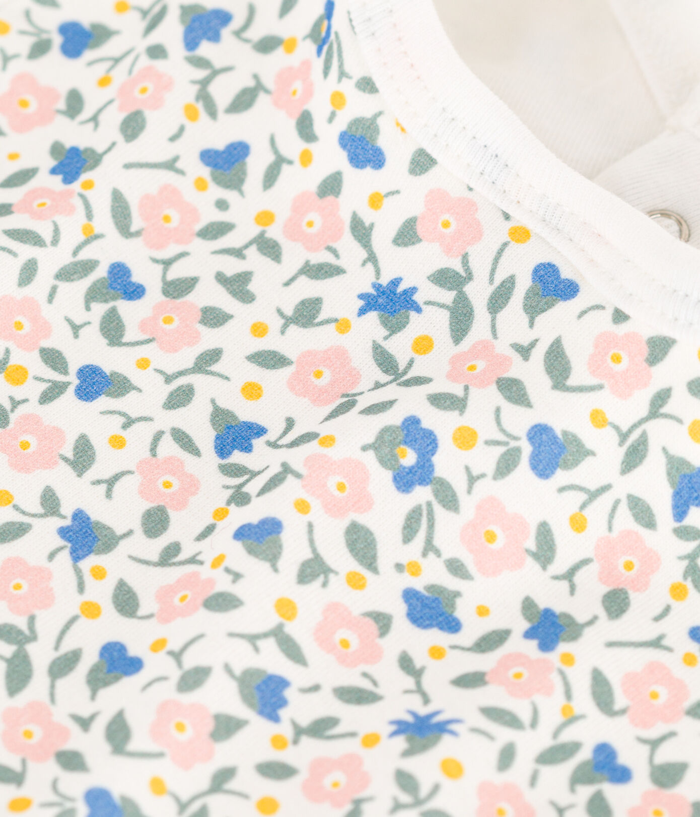 Bavoir unitaire fleurs en coton
