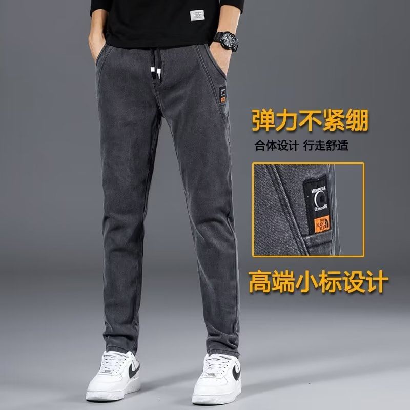 Acrius - Gewassen slim fit jeans met trekkoordtaille