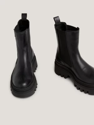 Botas Chelsea de couro com travas