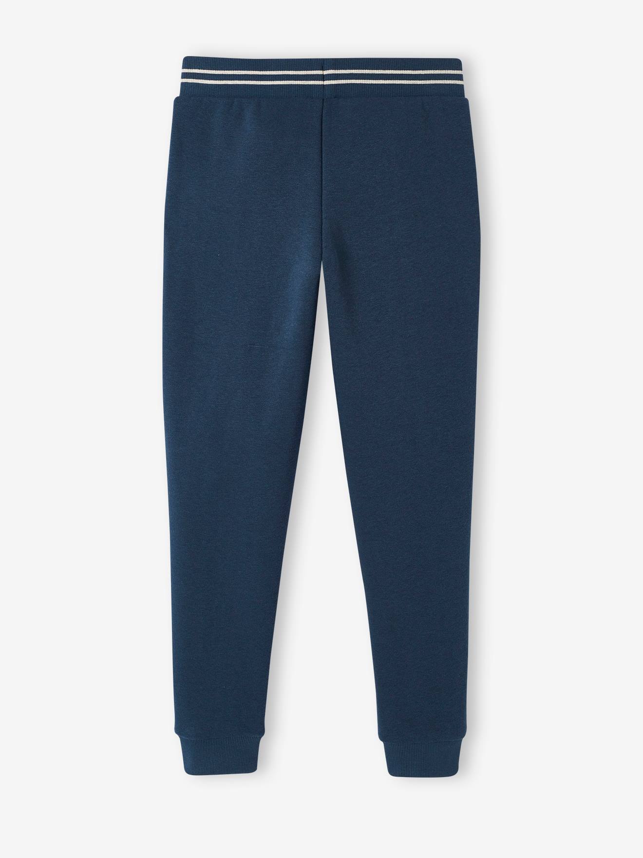 Calça de moletom esportiva azul marinho infantil com estampa de mascote.
