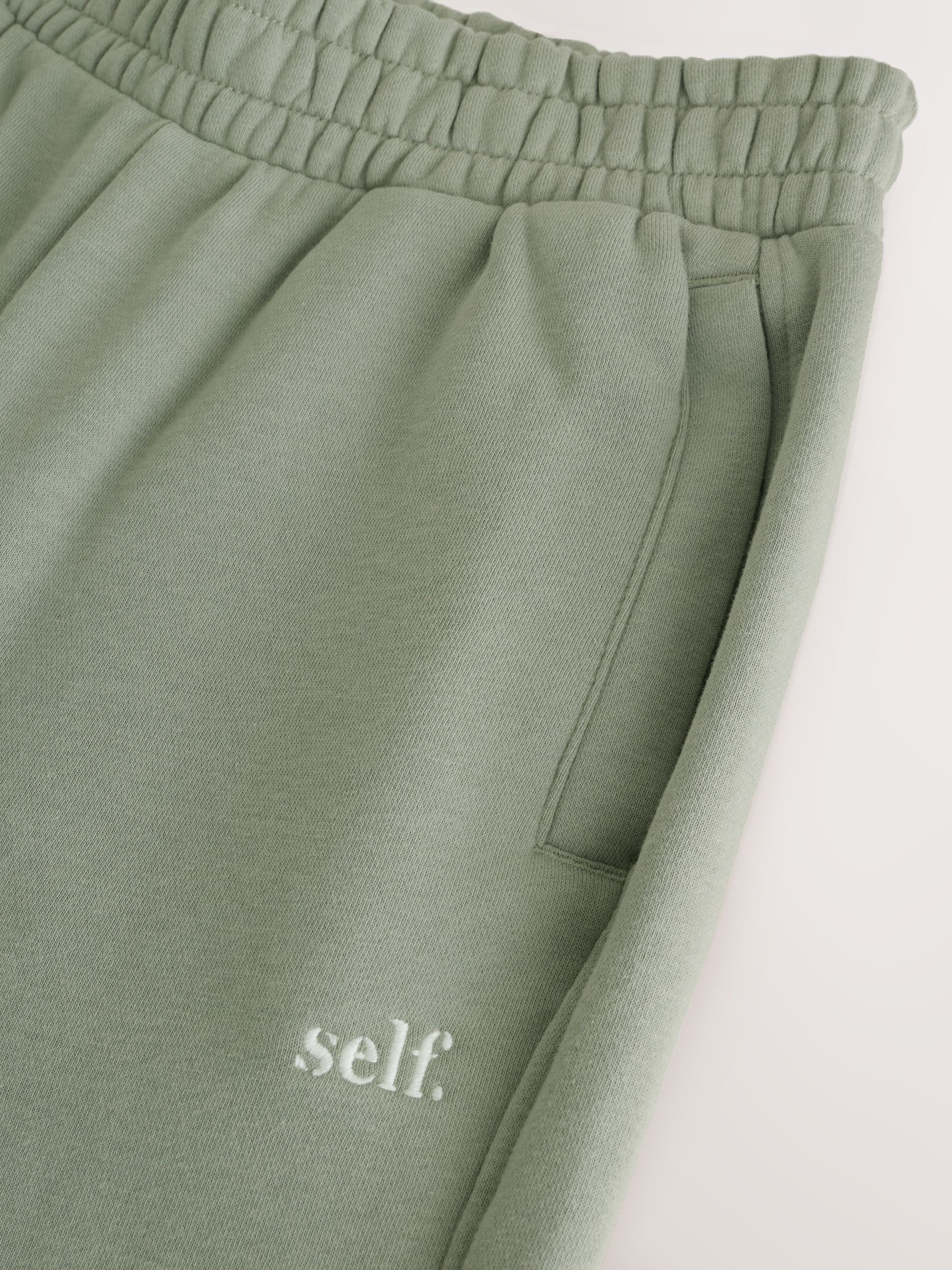 Grijs-groen - Self. joggingbroek met boorden