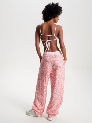 Top cropped ultra com amarração nas costas e distintivo