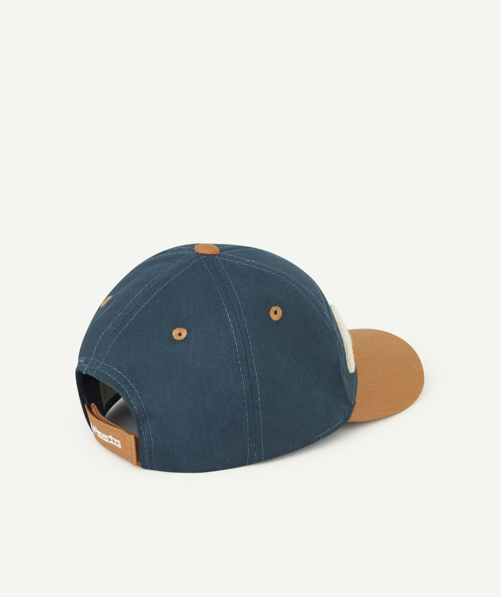LASSIGCASQUETTE BLEU MARINE AVEC MESSAGE RUN EN BOUCLETTE