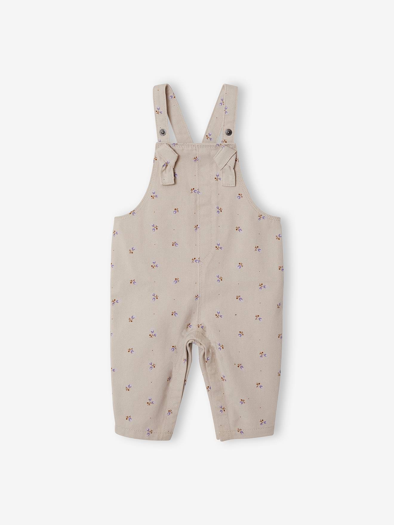Conjunto de body e blusa para bebê, bege médio com estampa.