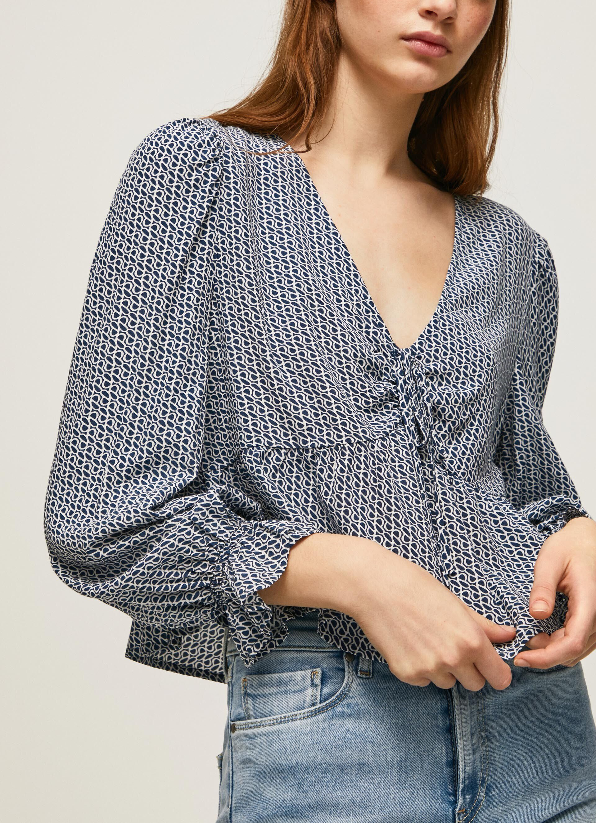 Blusa com estampa de logotipo por toda a peça - multicolorida