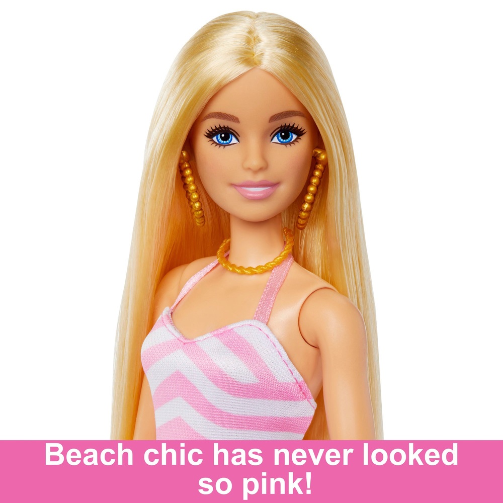 Blonde Barbie-Puppe mit Badeanzug und Strandaccessoires