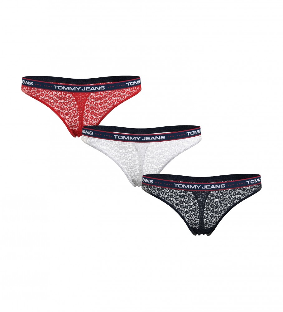 Conjunto de 3 calcinhas fio dental de renda Tommy Jeans nas cores vermelha, branca e azul-marinho.