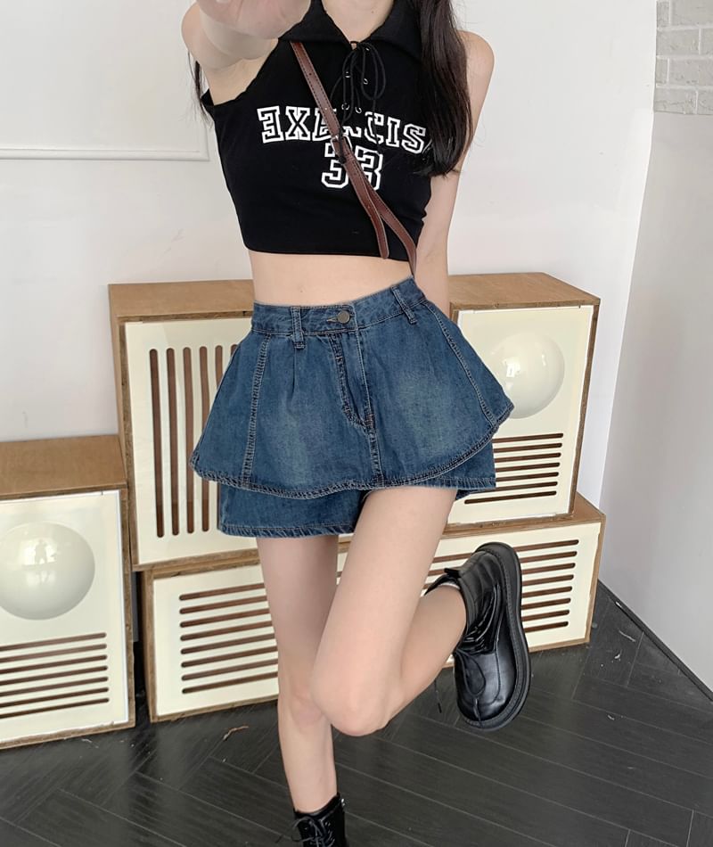 CosmoCorner - Gewassen mini-A-lijn denim skort met hoge taille en laagjes