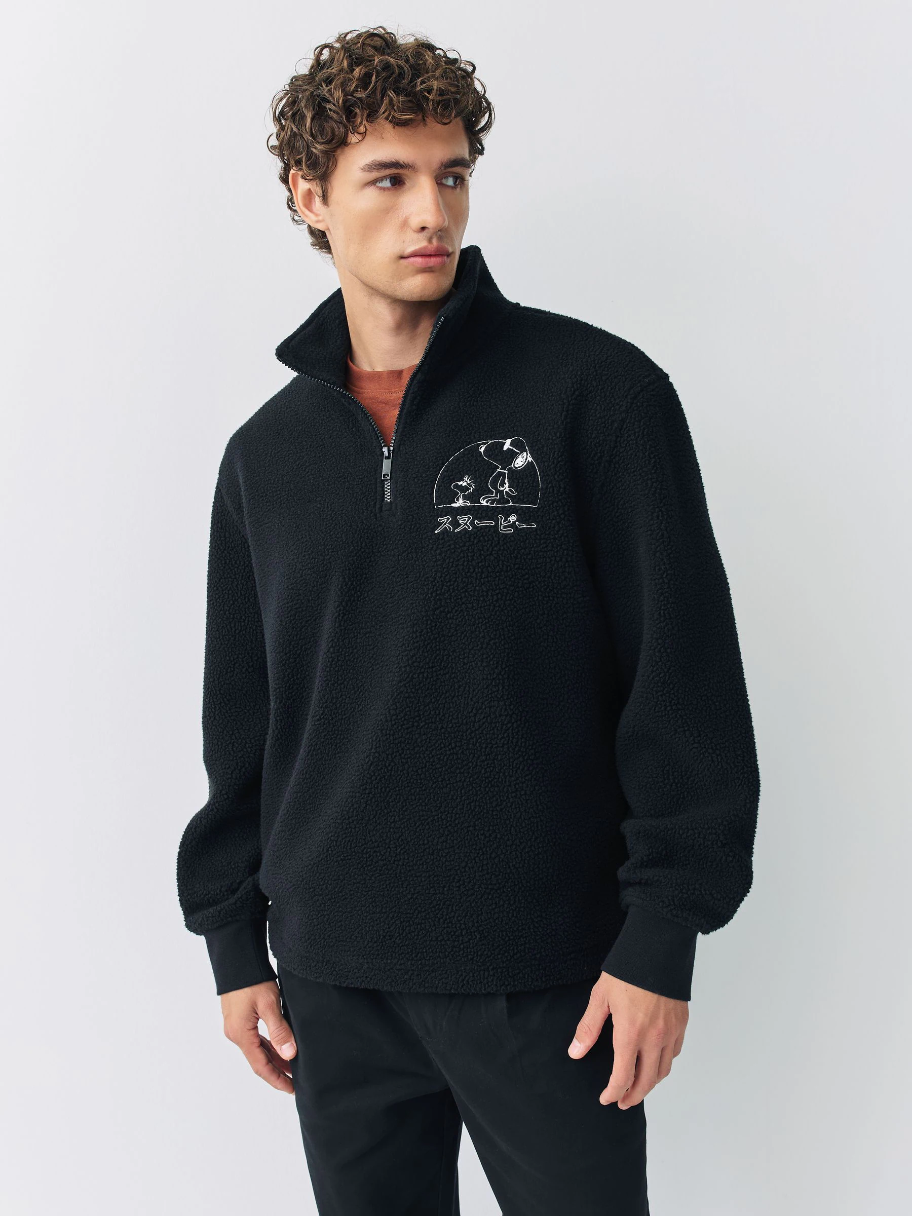 Zwart - Snoopy fleece met korte rits en licentieprint op de achterkant
