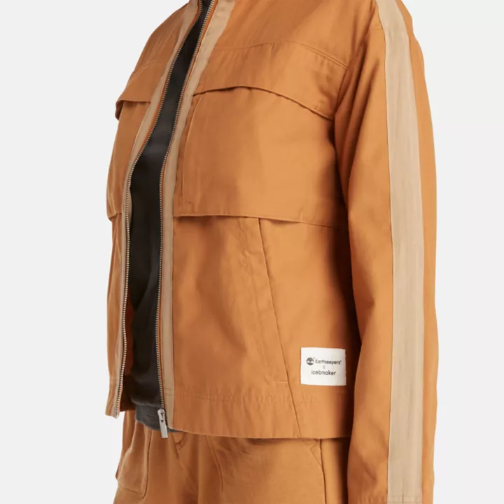 Jaqueta feminina Timberland x Icebreaker em algodão merino amarelo.