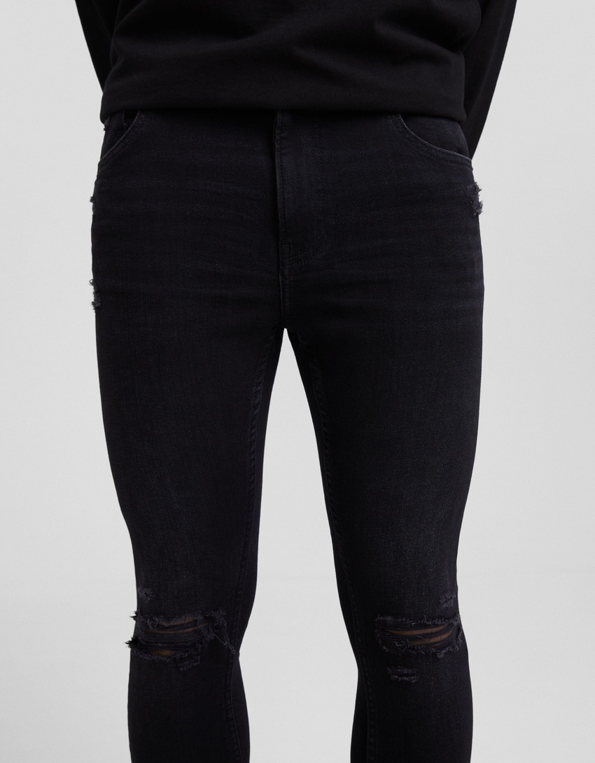 Calça jeans skinny rasgada