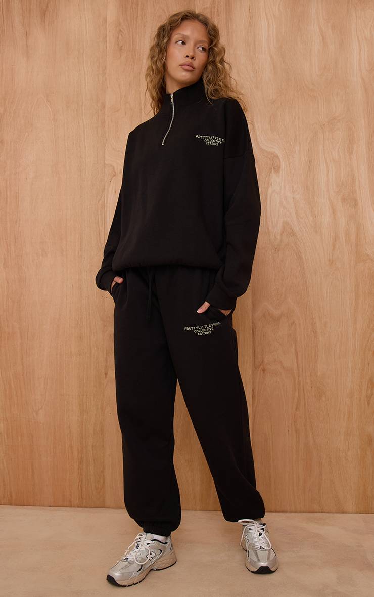 Noir Jogging Resserré Aux Chevilles Imprimé Prettylittlething