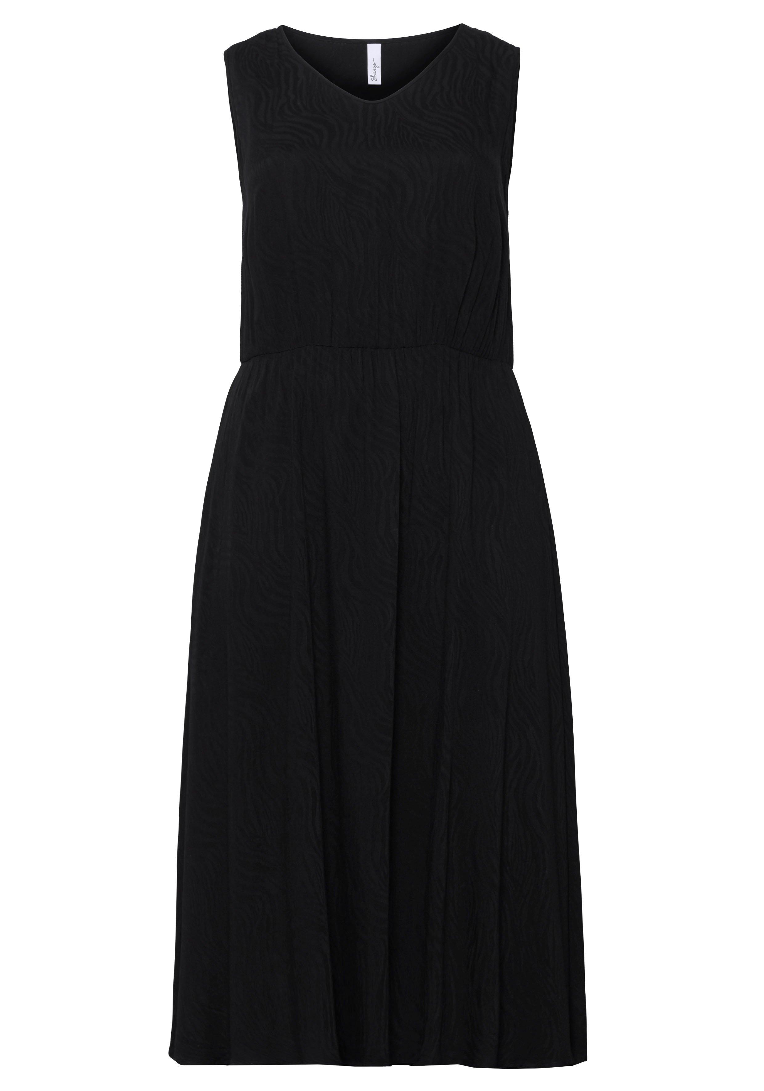 Set aus ärmellosem Kleid und kurzem Cardigan